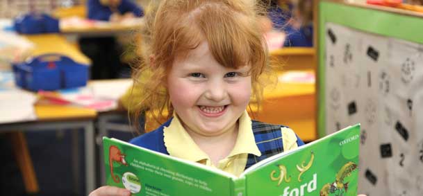 Child reading a book